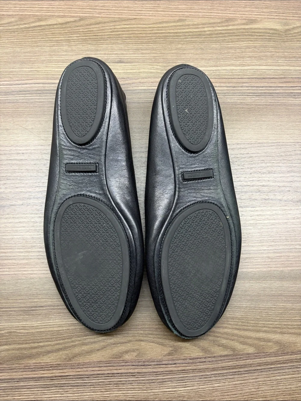 Tory Burch Black Leather Logo Medallion Flats with Gold Emblem